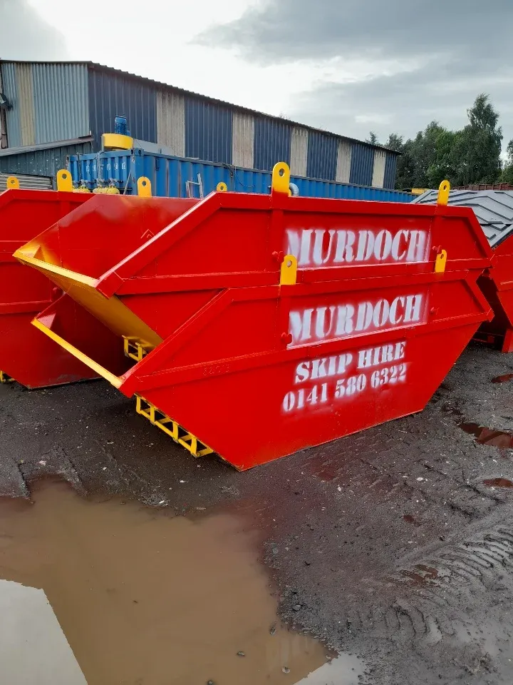 Skips refurbished and repainted in a customer's red livery