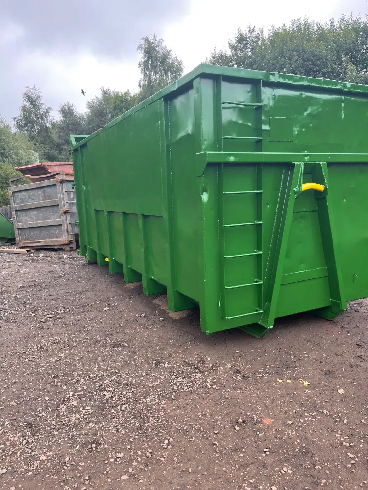 A roll-on roll-off container after full refurbishment, painted green